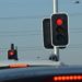 Two traffic lights with red lights